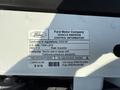 2009 Ford Ranger vehicle emission control information label displaying details about fuel type and compliance with regulations