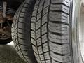 Close-up of two tires from a 2019 Chevrolet Express showing tread patterns and wear details