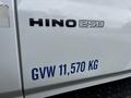 A white 2006 Hino 268 truck with the model name HINO 258 displayed on the side and the text GVW 11,570 KG in blue lettering