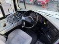 Interior view of a 2015 International 3000 bus showing the dashboard controls steering wheel and instrument panel