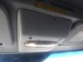 The image shows the overhead console of a 2016 Ford Transit featuring lights and control buttons