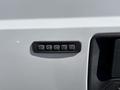 A keypad for keyless entry on the driver's side of a 2016 Ford F-550 featuring numeric buttons labeled 1 2 3 4 5 6 7 8 9 0