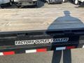 A 2020 Load Trail 28 Foot Gooseneck trailer with a wooden deck and a black frame displaying the text Factory Outlet Trailers