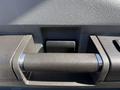 Close-up of a textured grip handle on the interior of a 2014 Ford F-250 SD
