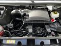 Close-up of the engine compartment of a 2020 Mercedes-Benz Sprinter highlighting the air filter assembly and various engine components