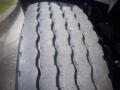 Close-up of a worn tire tread on a 2016 International WorkStar 7500 showcasing grooves and textures of the rubber
