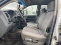 Interior view of a 2008 Dodge Ram 5500 showing the front seats and dashboard with gray upholstery and controls