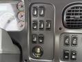 Control panel of a 2016 Freightliner 108SD featuring various switches and gauges for vehicle operation and monitoring