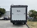 A 2021 Jayco Jay Flight travel trailer with a white rear panel featuring the Jayco logo at the center