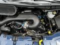 The image shows the engine compartment of a 2017 Ford Transit 350 featuring an engine assembly with various components including hoses and electrical connectors