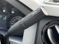 Close-up of the tow/haul control lever inside a 2016 Ford F-550