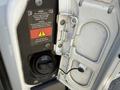 Close-up of the fuel filler door of a 2016 Mercedes-Benz Sprinter showing a diesel fuel inlet and warning labels against using the wrong fuel type