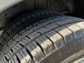 Close-up of two tires from a 2017 Ford Transit showing tread pattern and wear details