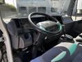 Interior of a 2007 GMC W3500 featuring a steering wheel dashboard and driver's seat