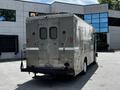 A 2008 Morgan Olson Workhorse vehicle with a metallic exterior featuring multiple compartments and windows at the back