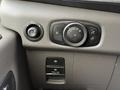 2022 Ford Transit dashboard controls featuring knobs for headlights and fog lights and a button labeled PULL ON