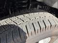 Close-up of a 2019 Ford Econoline tire showing tread pattern and rubber wear details