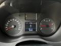 Dashboard of a 2020 Mercedes-Benz Sprinter displaying speedometer and tachometer with various indicators and a digital display showing time and speed
