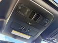 Interior overhead console of a 2021 Subaru WRX featuring light controls and a sunroof mechanism