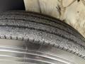 Close-up view of a tire from a 2011 International 4300 showing tread patterns and wear on the rubber surface