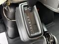 Gear shift lever of a 2014 International TerraStar showing positions P R N 4 2 1