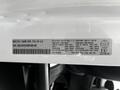 A 2021 RAM Promaster with a visible manufacturer label detailing specifications and vehicle identification information