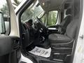 Interior view of a 2018 RAM Promaster showing driver's seat dashboard and floor mat with text Thank you