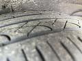 Close-up of a tire tread on a 2005 Chrysler PT Cruiser showing detailed grooves and patterns on the rubber surface