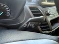 Close-up view of the control stalk in a 2021 Ford Transit Connect showing the turn signal and windshield wiper controls