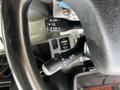 Control switches on the steering wheel of a 2018 Hino 195 truck with indicators for settings and functions