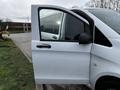 A 2018 Mercedes-Benz Metris with its driver's side door open revealing the interior and dashboard