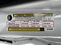 A 2018 RAM Promaster tire information sticker detailing tire sizes and load capacities