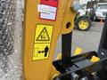 A 2024 AGT Industrial Yellow H13R Mini Excavator with an attached warning label showing a cartoon figure and an arrow indicating a safety operation area