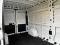 Interior of a 2021 RAM Promaster van showing empty cargo space with white metal walls and black floor matting