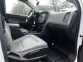 Interior of a 2018 Chevrolet Colorado showing the driver's seat and dashboard with controls and gear shift