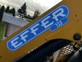 A close-up of a blue and white EFFER 155 logo on the side of a piece of equipment