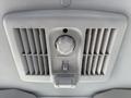 Interior view of the air conditioning unit with a control knob and vents in a 2007 GMC W5500 18 Foot Cube Van