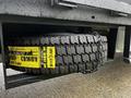 A 2017 Ford F-550 truck with a visible spare tire mounted under its bed