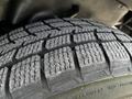 Close-up view of a tire on a 2010 Ford Ranger showcasing its tread pattern and detailing