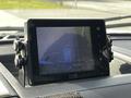 A 2018 Ford F-550's rearview camera display showing a blue truck outline on the screen
