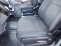 Interior of a 2016 Mercedes-Benz Sprinter showing the driver's seat and passenger seat both in black fabric upholstery