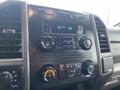 Dashboard of a 2017 Ford F-250 SD featuring radio controls climate controls and a digital display