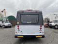 2017 Chevrolet Express with a white and gray exterior featuring rear lights and a rear window design