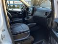 Interior of a 2022 Mercedes-Benz Metris featuring black leather seats and a modern dashboard with controls and a display screen