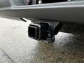 Close-up of the hitch receiver on a 2021 Chevrolet Silverado 3500HD showing the square opening and sturdy mounting structure