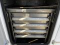 A 2018 Ford F-550 featuring multiple metal drawers labeled with various tools and supplies such as plastic bags zip ties picks and scrapers