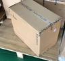 Brown cardboard box labeled Antminer on a wooden pallet