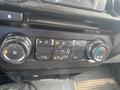 Controls for heating and air conditioning in a 2017 Ford F-550 with buttons and dials for fan speed temperature and air distribution settings