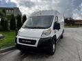 A 2019 RAM Promaster cargo van with a white exterior and black front grille, featuring a streamlined design and large windshield