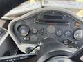 Dashboard of a 2015 Global Street Sweeper featuring various dials and gauges for monitoring vehicle status and performance